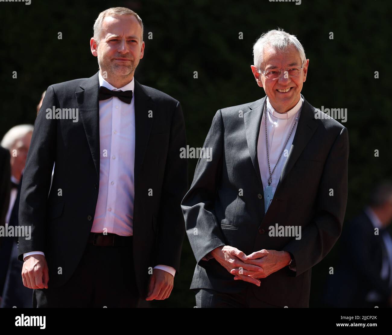 Bayreuth, Germany. 25th July, 2022. Archbishop Ludwig Schick (r) at the opening of the Bayreuth Richard Wagner Festival in the Festspielhaus on the Grüner Hügel. The festival begins this year with a new production of 'Tristan and Isolde. Credit: Daniel Karmann/dpa/Alamy Live News Stock Photo