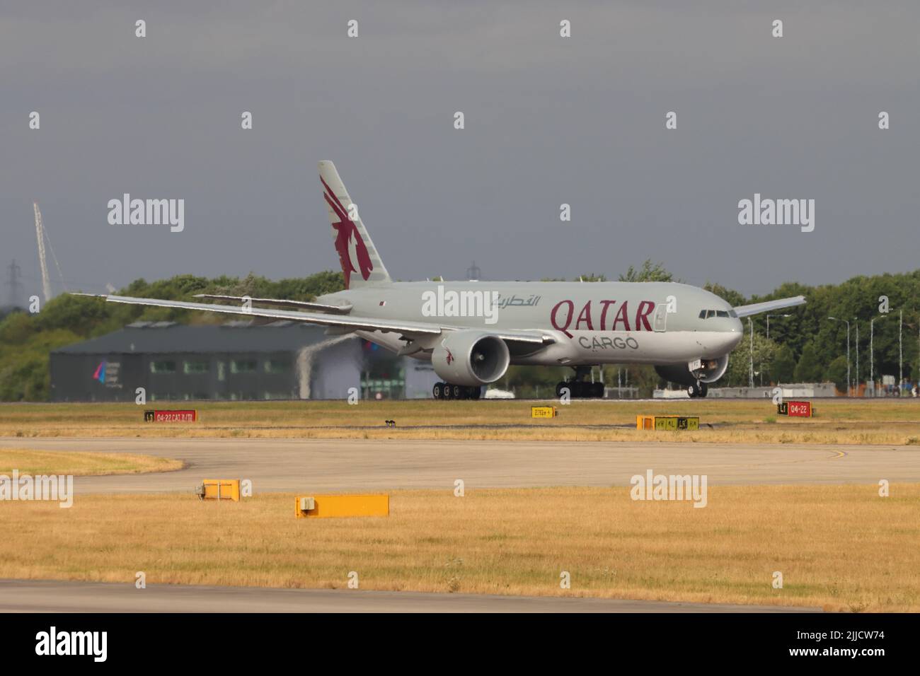 Qatar Cargo, Boeing 777 A7-BFZ, departing Stansted Airport, Essex, UK Stock Photo
