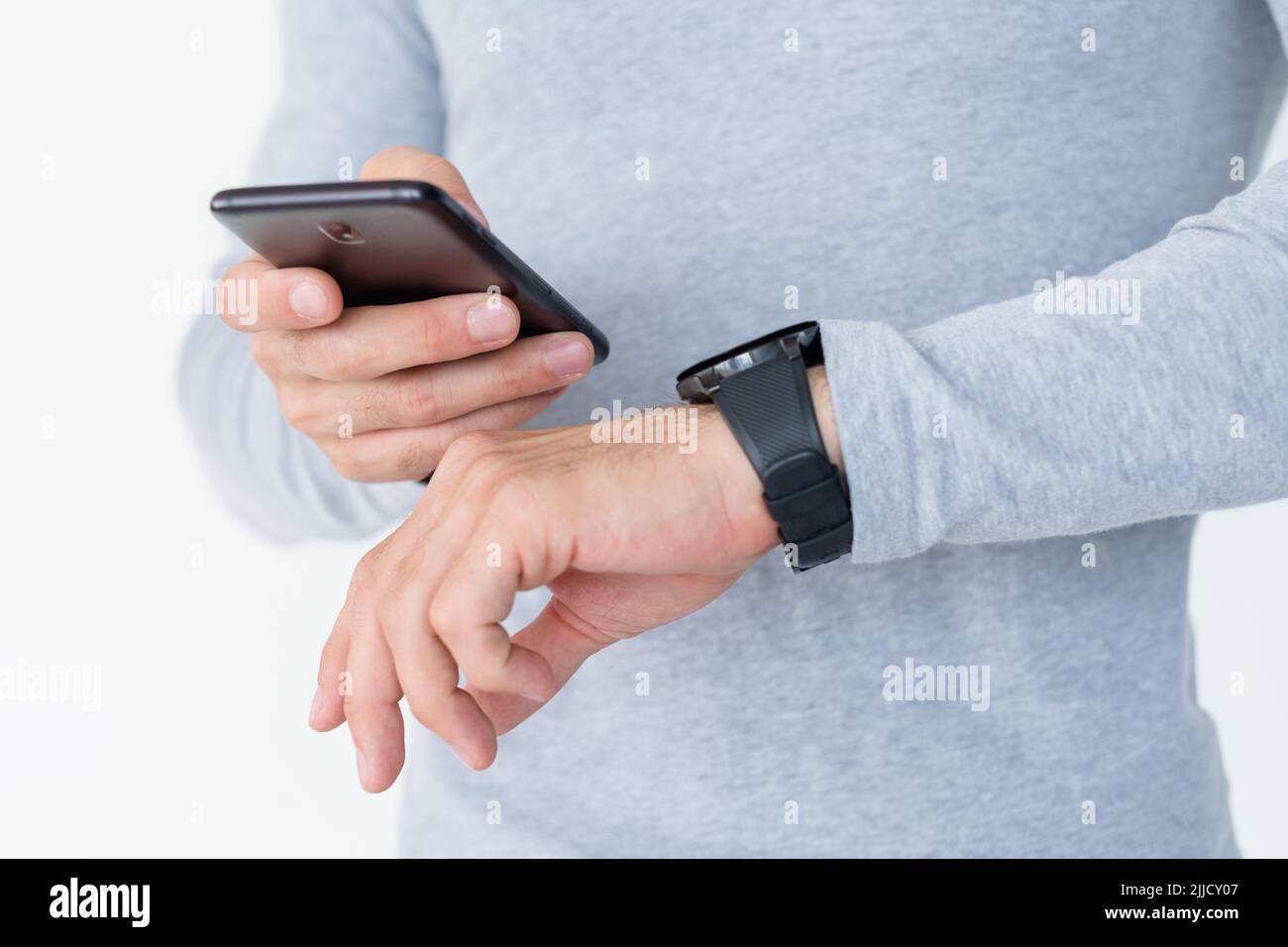 smart watch wearable technology man check phone Stock Photo