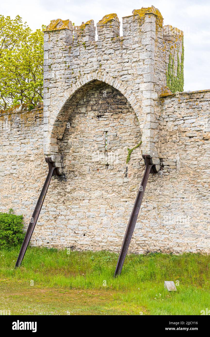 Modern metal buttresses supporting Visby City Wall (Visby Ringmur Visby Ring Wall) around the medieval town of Visby on the island of Gotland in the B Stock Photo