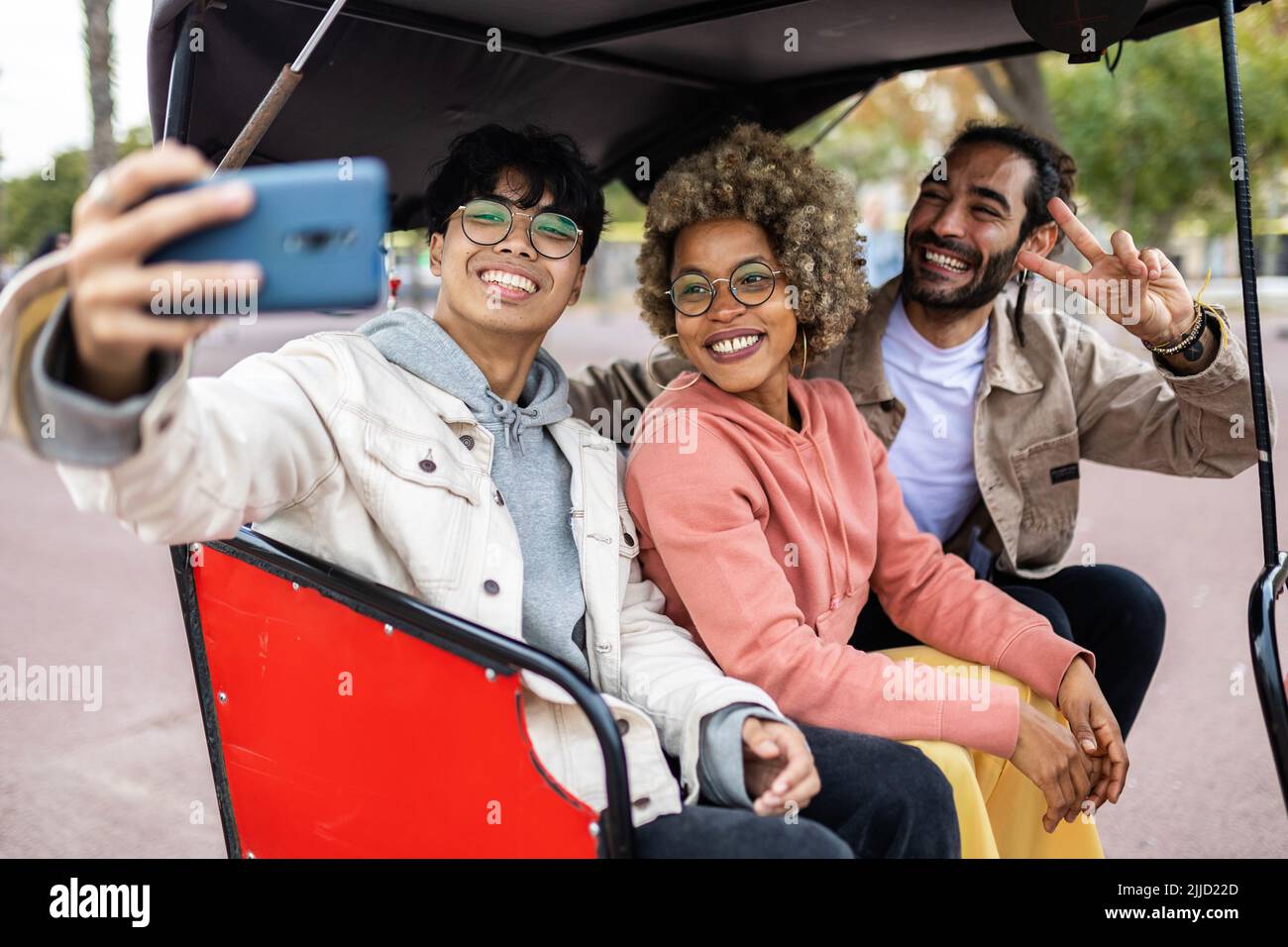 Multiracial young friends having fun taking selfie together on vacation Stock Photo
