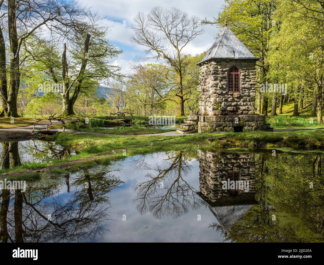 Springtime at the park of baroniet Rosendal, pond with tower, Rogaland, Norway. Stock Photo