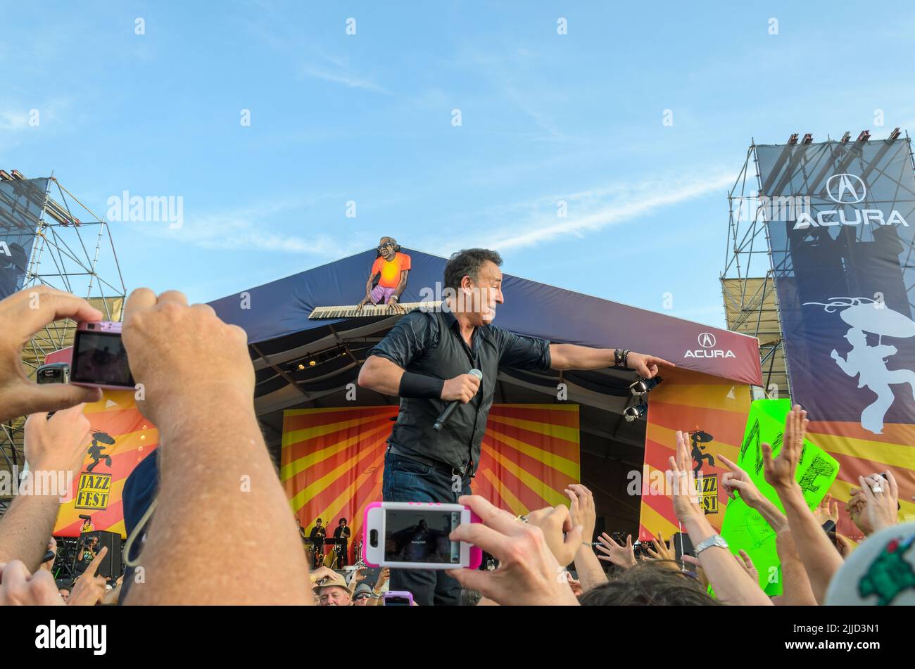 Bruce Springsteen performing amidst the crowd at the New Orleans Jazz and Heritage Festival on April 29, 2012 Stock Photo