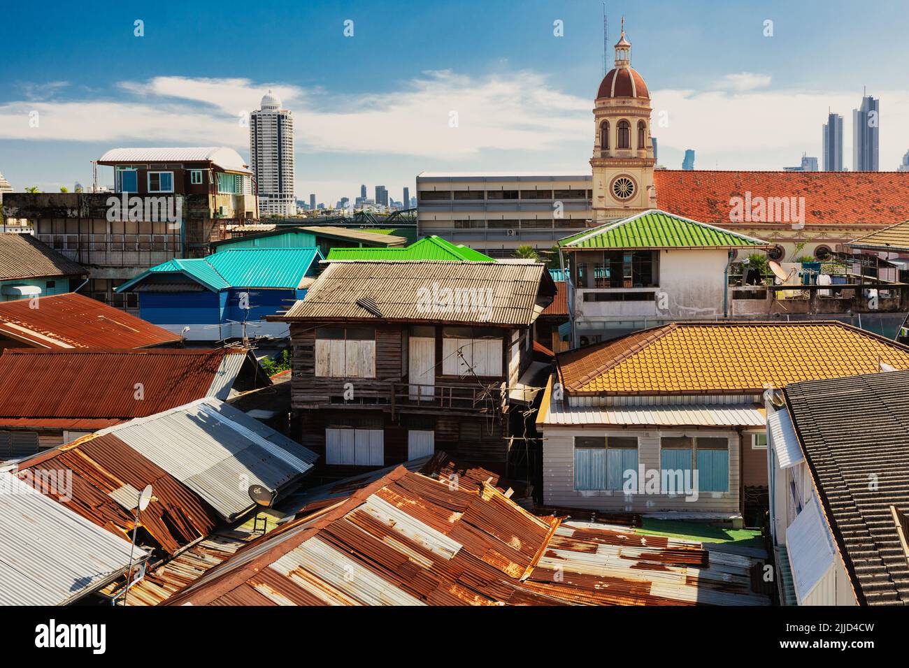 Old metal roofs and Santa Cruz catholic church in the Kudee Jin Portuguese district, Bangkok, Thailand Stock Photo