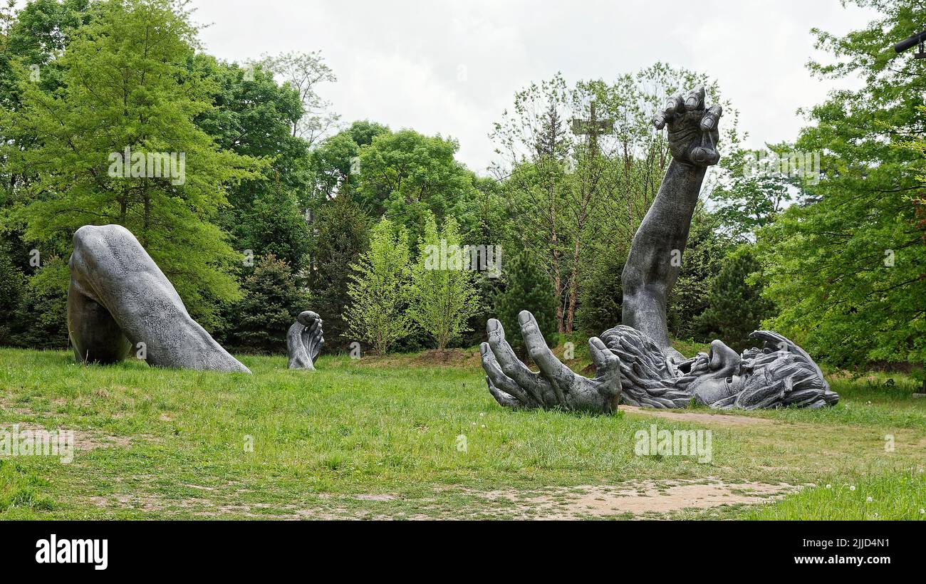The Awakening; 70 foot long sculpture; aluminum, by Seward Johnson
