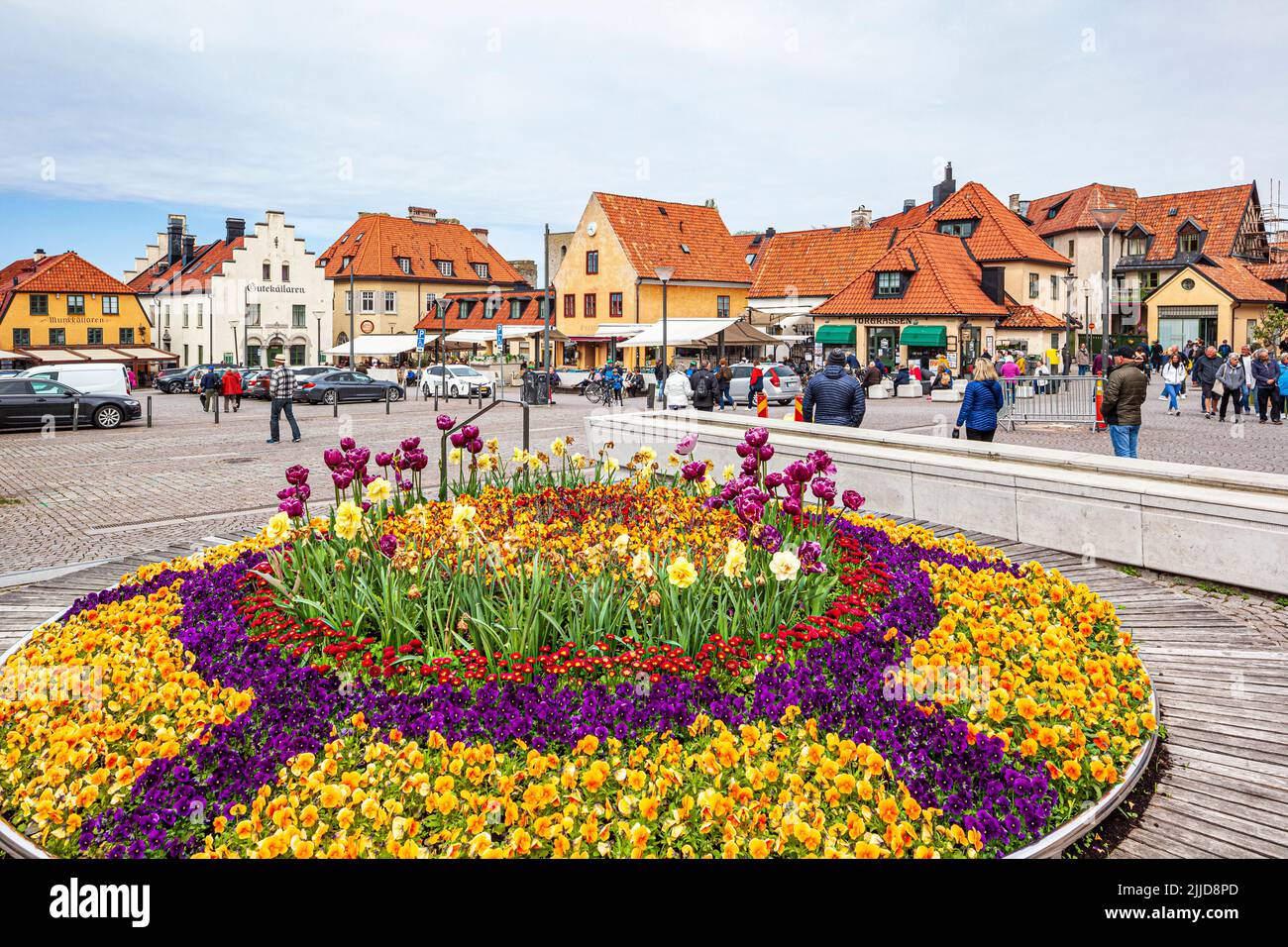 Floral displays in the Great Square (Stora Torget) in the medieval town of Visby on the island of Gotland in the Baltic Sea off Sweden Stock Photo