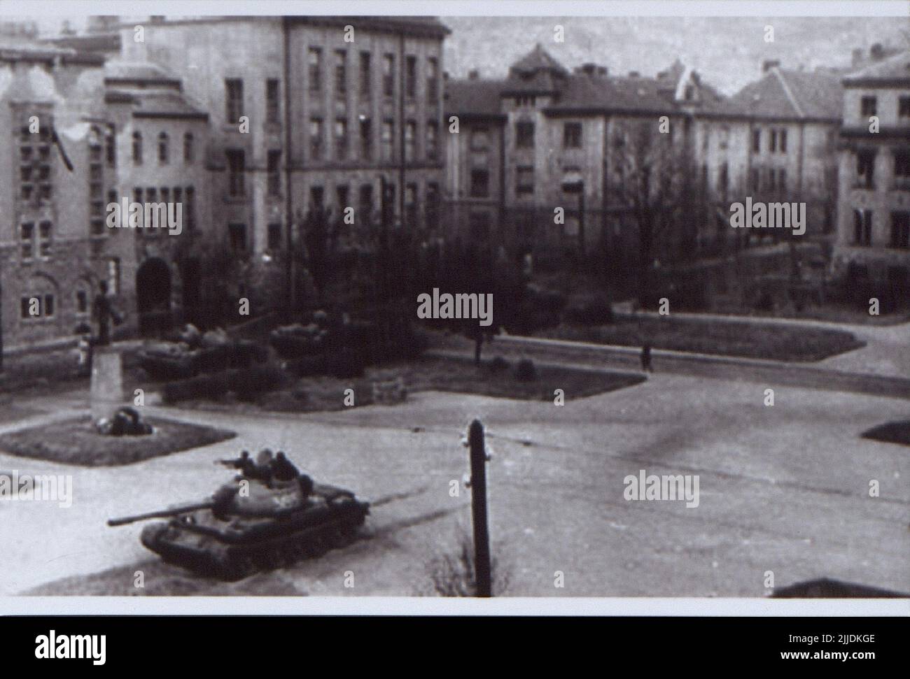 Pécsi Square with T-54 tank. T-54 cruiser-tank on a square of Pécs. The Local History Collection of Csorba Gyz Könyvtár Library has been collecting photos and postcards related to Baranya County since January 1966. According to the data updated on 1st February 2016, the collection consists of 11,565 copies. As the result of the digitisation project that started in 2012, the Collection includes about 59,000 black-and-white and coloured records of different sizes and types, which are searchable through the electronic catalogue. The famous postcard collector Tibor Endre Tóth has procured a postca Stock Photo