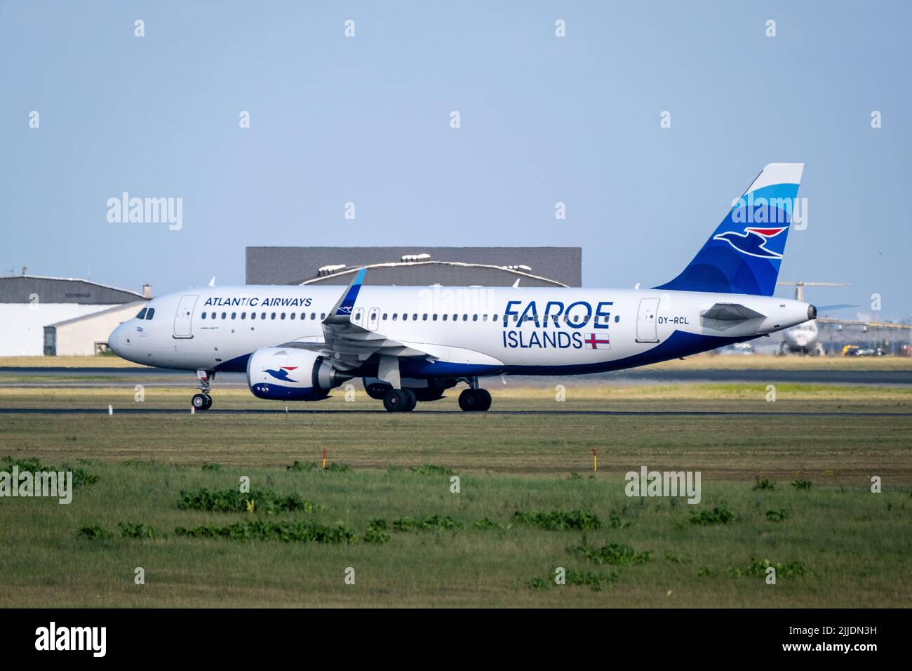 Copenhagen / DENMARK - JULY 22, 2022: Airbus A320, operated by Atlantic Airways, the flag carrier of Faroe Islands taxiing at Copenhagen airport CPH. Stock Photo