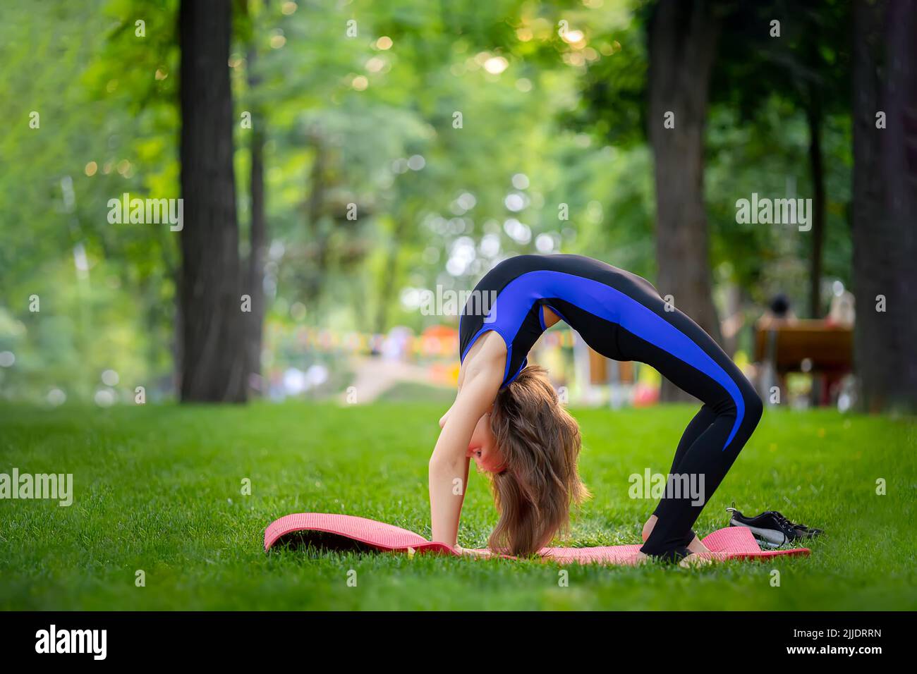 Cute little girl practice yoga Stock Photo - Alamy