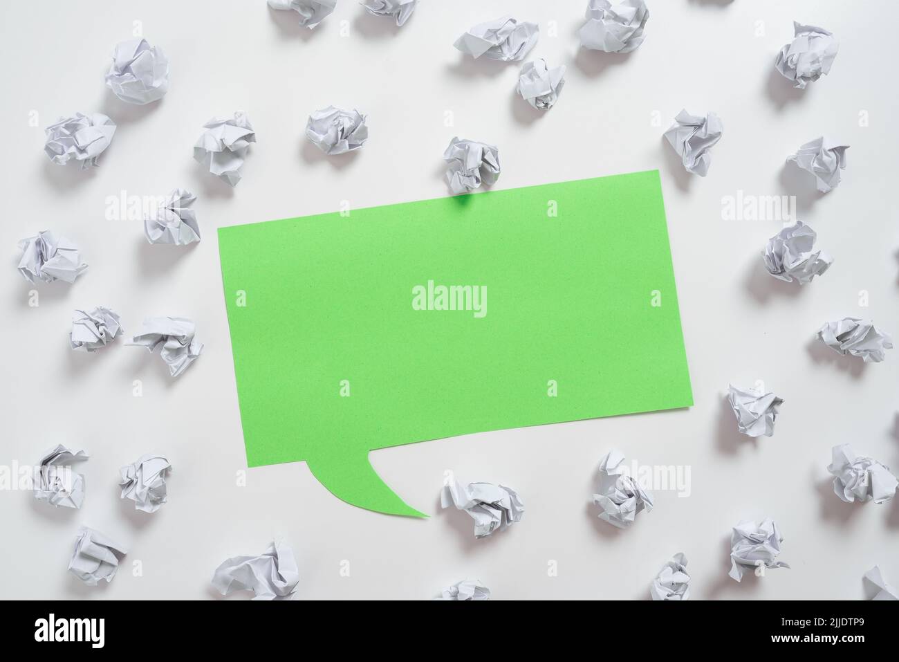 Paper Wraps Placed Around Speech Bubble With Important Information. Stock Photo