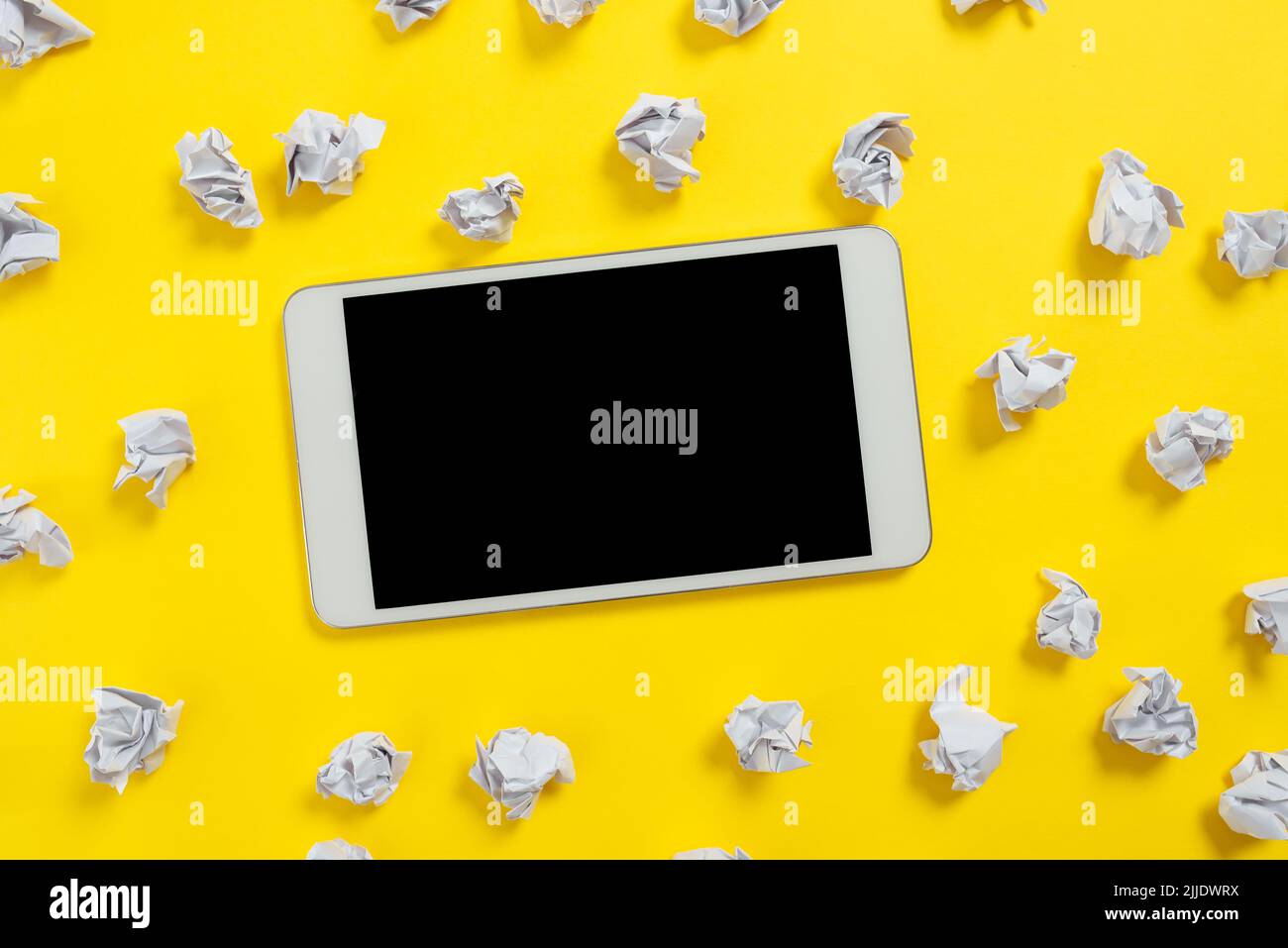 Paper Wraps Placed Around Tablet With Important Informations. Stock Photo