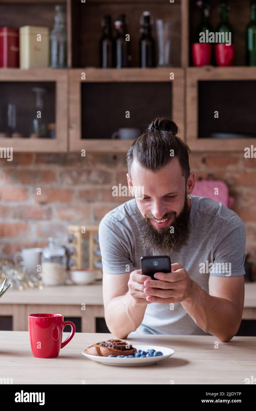 blog addict lifestyle man breakfast mobile photo Stock Photo