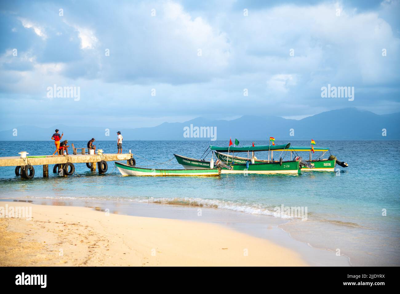 Local fisherman fishing from a pier in the San Blas Islands in Panama Stock Photo