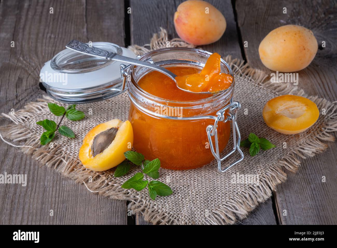 Apricot jam in glass jar hi-res stock photography and images - Alamy