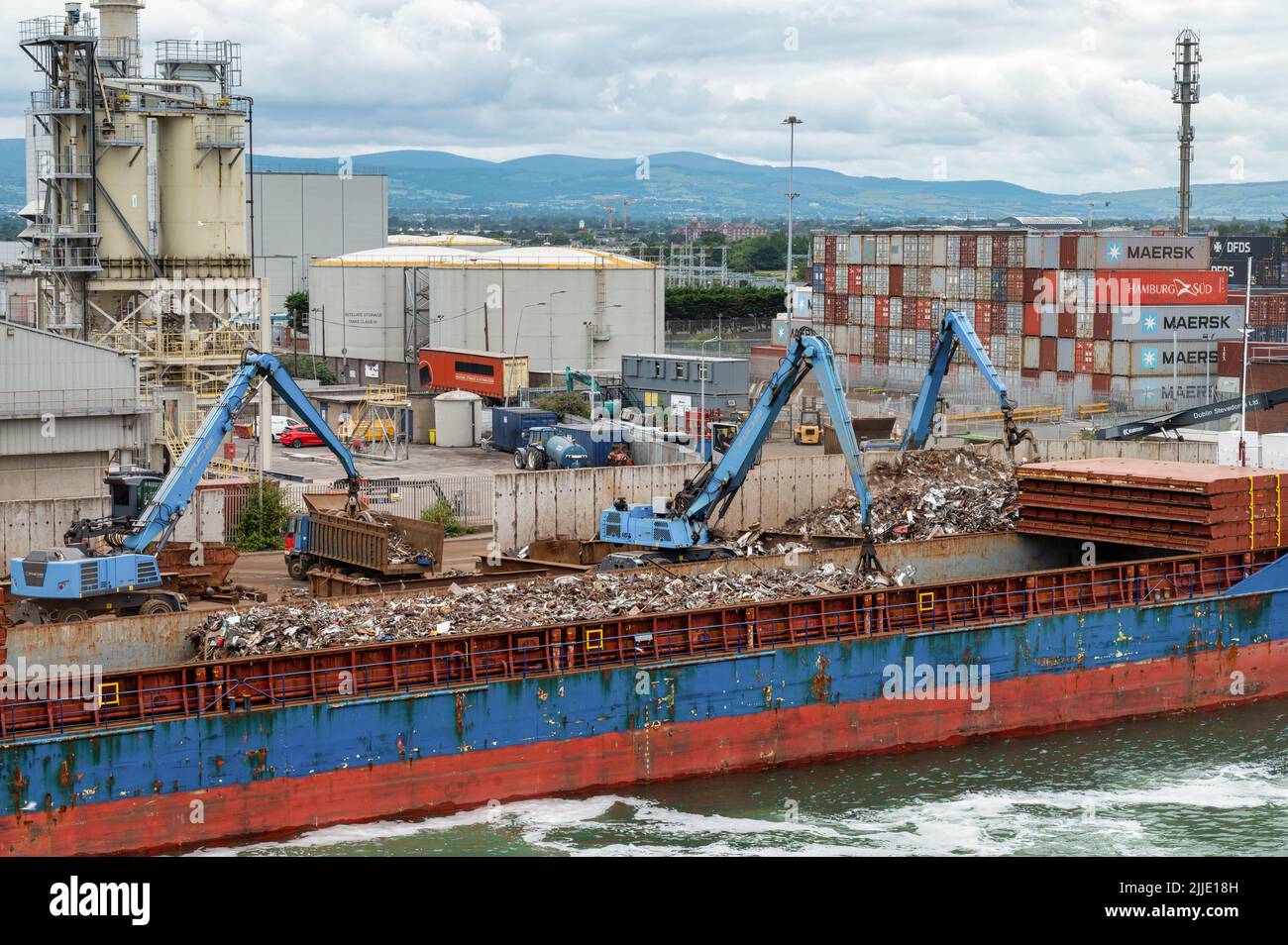 Dublin, Ireland- July 7, 2022: Scrap metal getting loaded onto a ship in Dublin Port Stock Photo