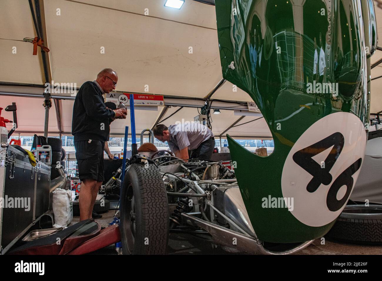 The famous green and yellow Lotus Formula 1 cars n the pits of the historic Grand Prix in Monaco Stock Photo