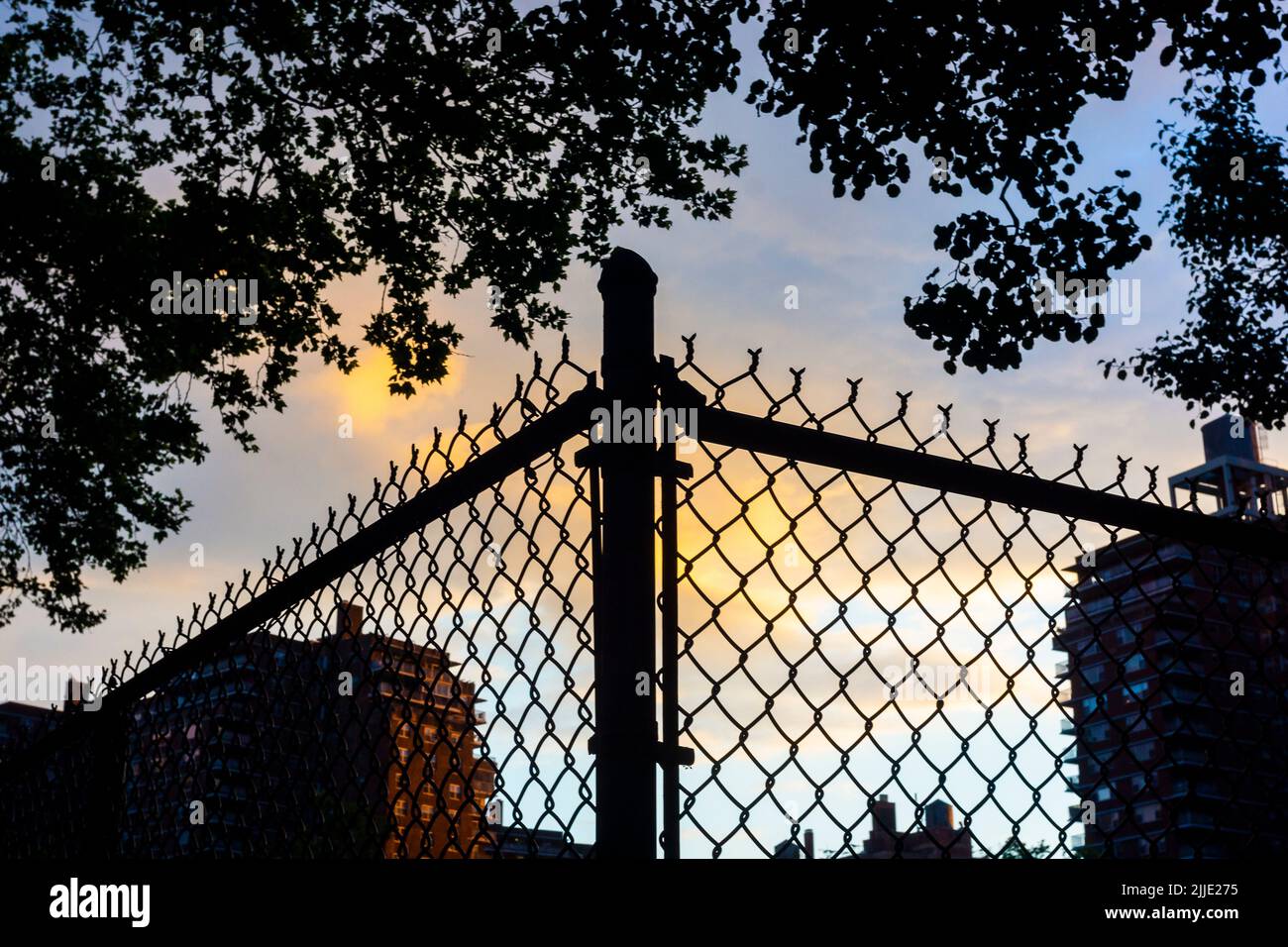 Chicken wire fencing in Chelsea in New York on Wednesday, June 22, 2022. (© Richard B. Levine) Stock Photo