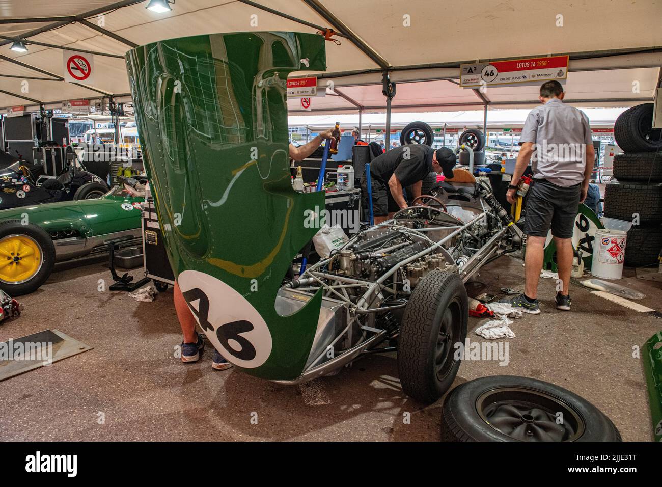 The famous green and yellow Lotus Formula 1 cars n the pits of the ...