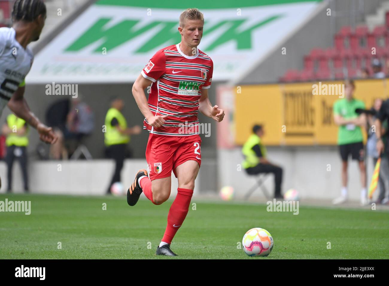 Augsburg, WWK Arena. 23rd July, 2022. Frederik WINTHER (FC Augsburg), action, single action, single image, cut out, full body shot, full figure football test match FC Augsburg - Stades Rennes on July 23rd, 2022 in Augsburg, WWK Arena. #DFL regulations prohibit any use of photographs as image sequences and/or quasi-video # ? Credit: dpa/Alamy Live News Stock Photo