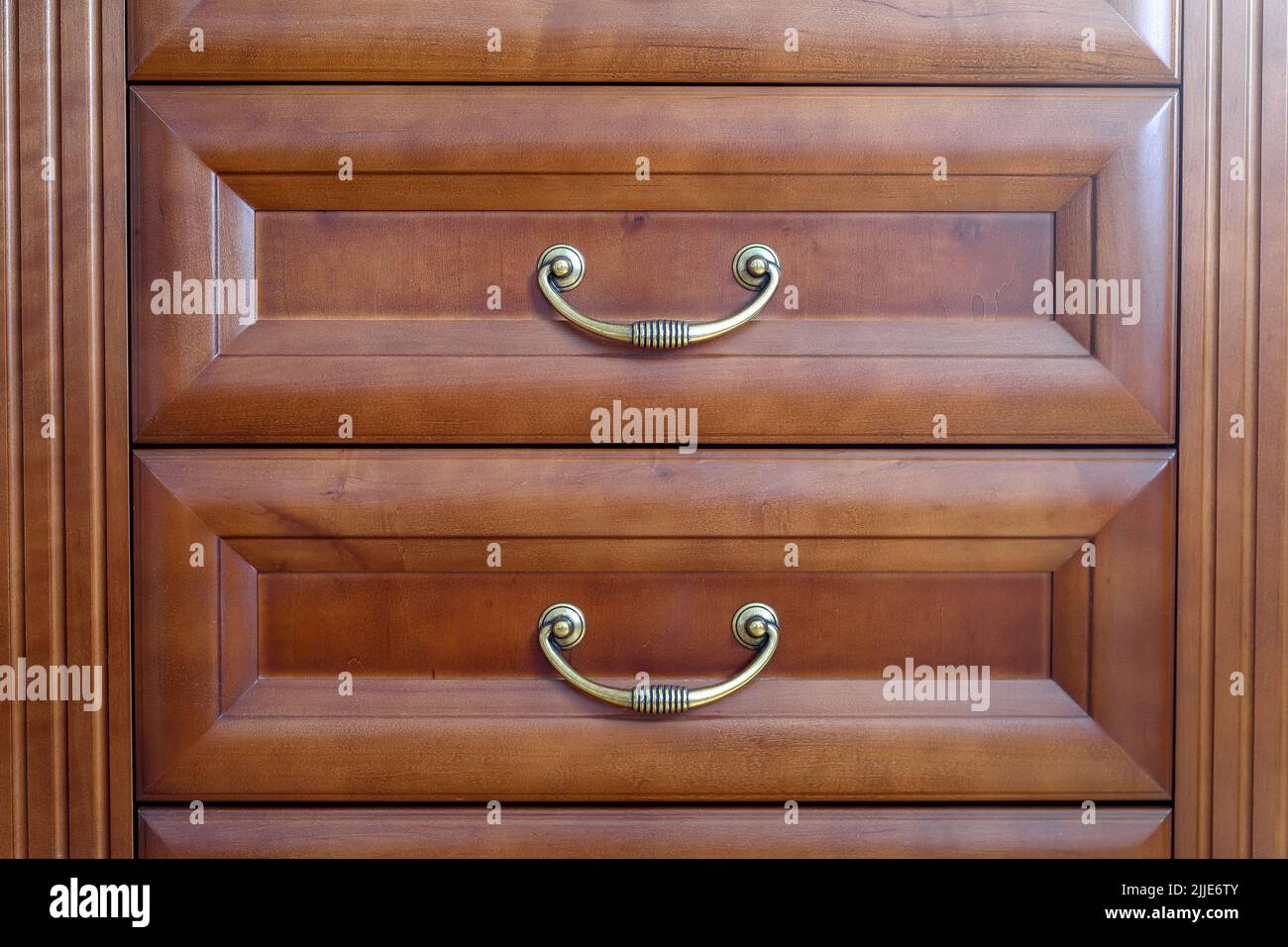 Brown cupboard with two drawers inside a house Stock Photo