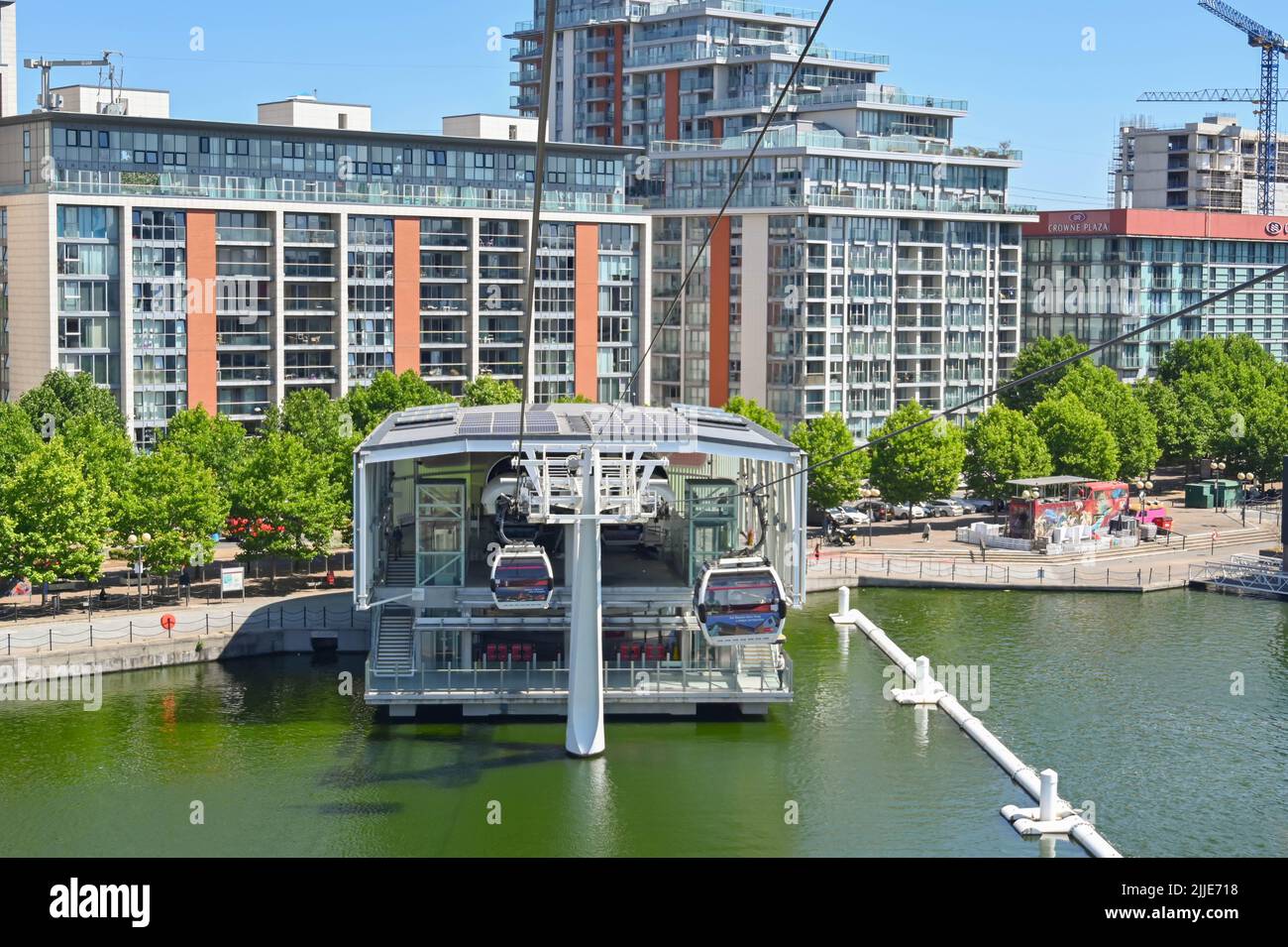 London, United Kingdom - June 2022: Carriage on the Emirates Skyline aerial cable car system descending to the base station. Stock Photo