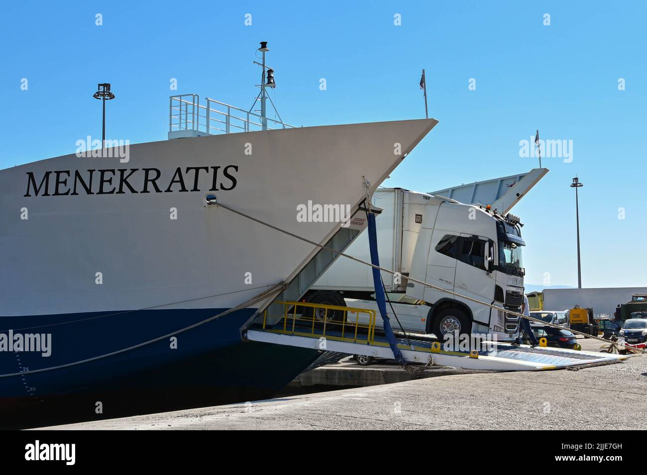 Corfu, Greece - June 2022: Articulated lorry reversing onto a commercial car ferry in the harbour of Corfu town Stock Photo