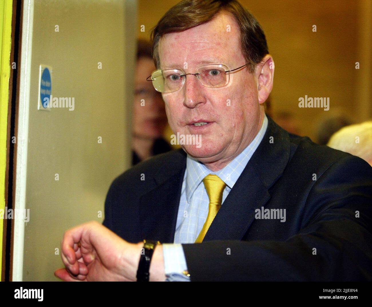 File photo dated 28/11/2003 of Ulster Unionist Leader David Trimble checks his watch as the counting of election votes continues in Banbridge Co Down. The Former Northern Ireland first minister has died, the Ulster Unionist Party has announced. Issue date: Monday July 25, 2022. Stock Photo