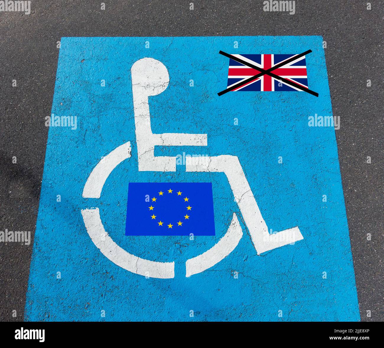 Disabled parking bay with EU and UK flag. Stock Photo