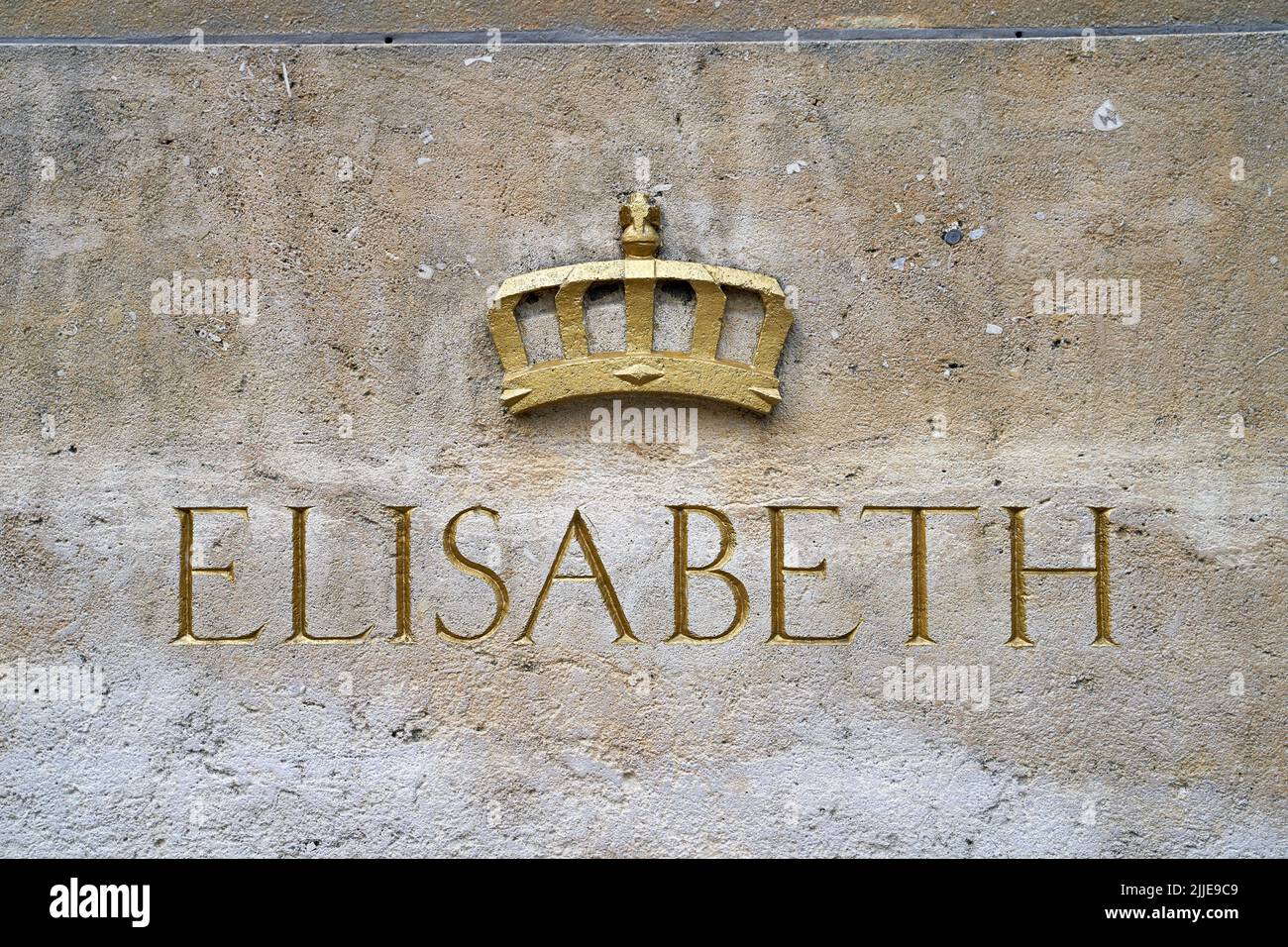 Name Elizabeth with a crown on the pedestal of the Statue of Queen Elisabeth I, in Brussels, Belgium. Stock Photo