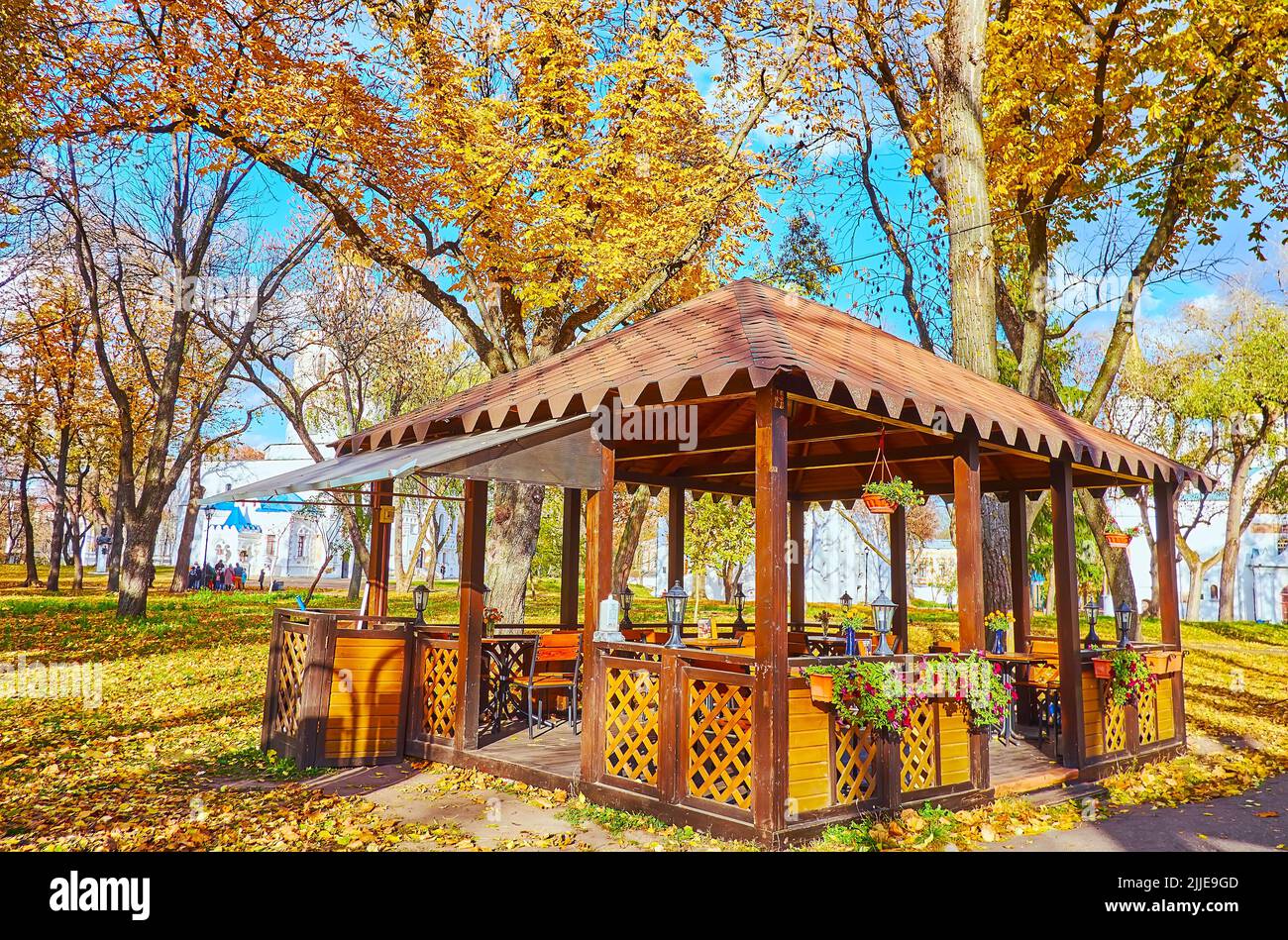 The wooden summer house in autumn park of Chernihiv Citadel, Ukraine Stock Photo