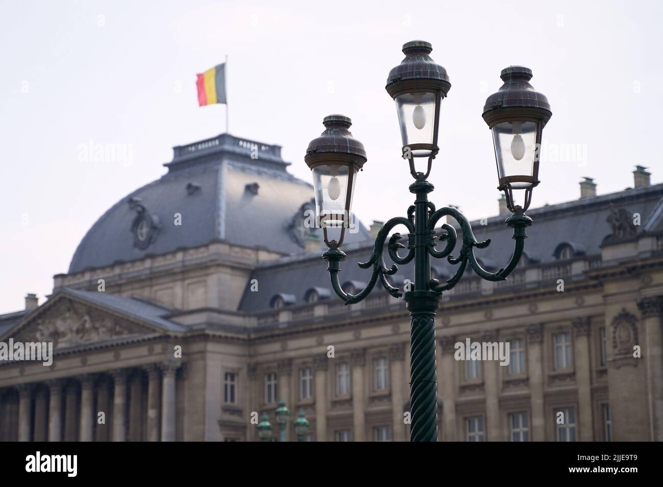 Lantern in Brussels, Belgium with the Royal Palace and National flag on background Stock Photo