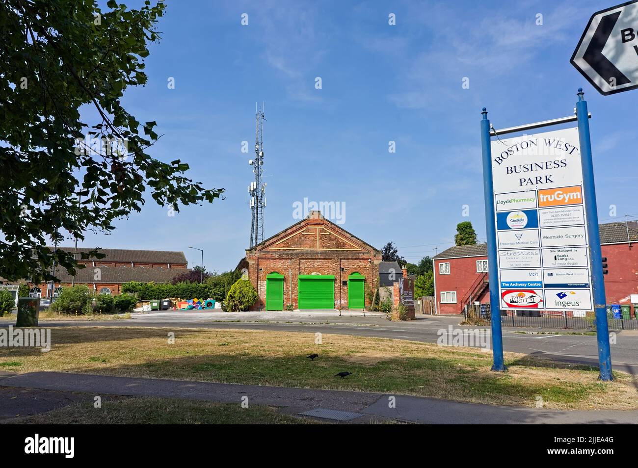 Boston West business Park with imformation sign in foreground on a sunny summer's day. Stock Photo