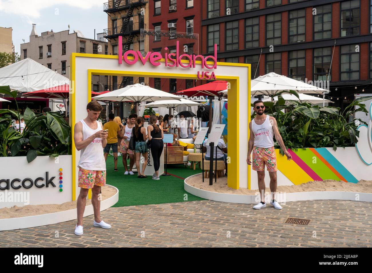 Visitors brave the excessive heat to flock to Peacock’s “Love Island: USA” brand activation in the Meatpacking District of New York on Wednesday, July, 20, 2022. Originally developed in the UK, the “reality” dating series is in its fourth season and premiered on the streaming network on July 19. (© Richard B. Levine) Stock Photo