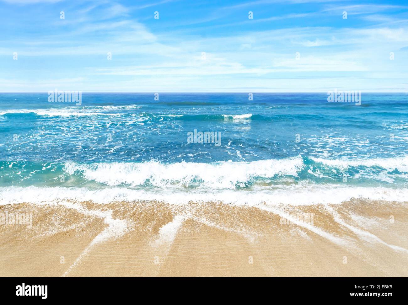 Wide angle beach photo of sky, sea and sand as a luxury summer holiday ...