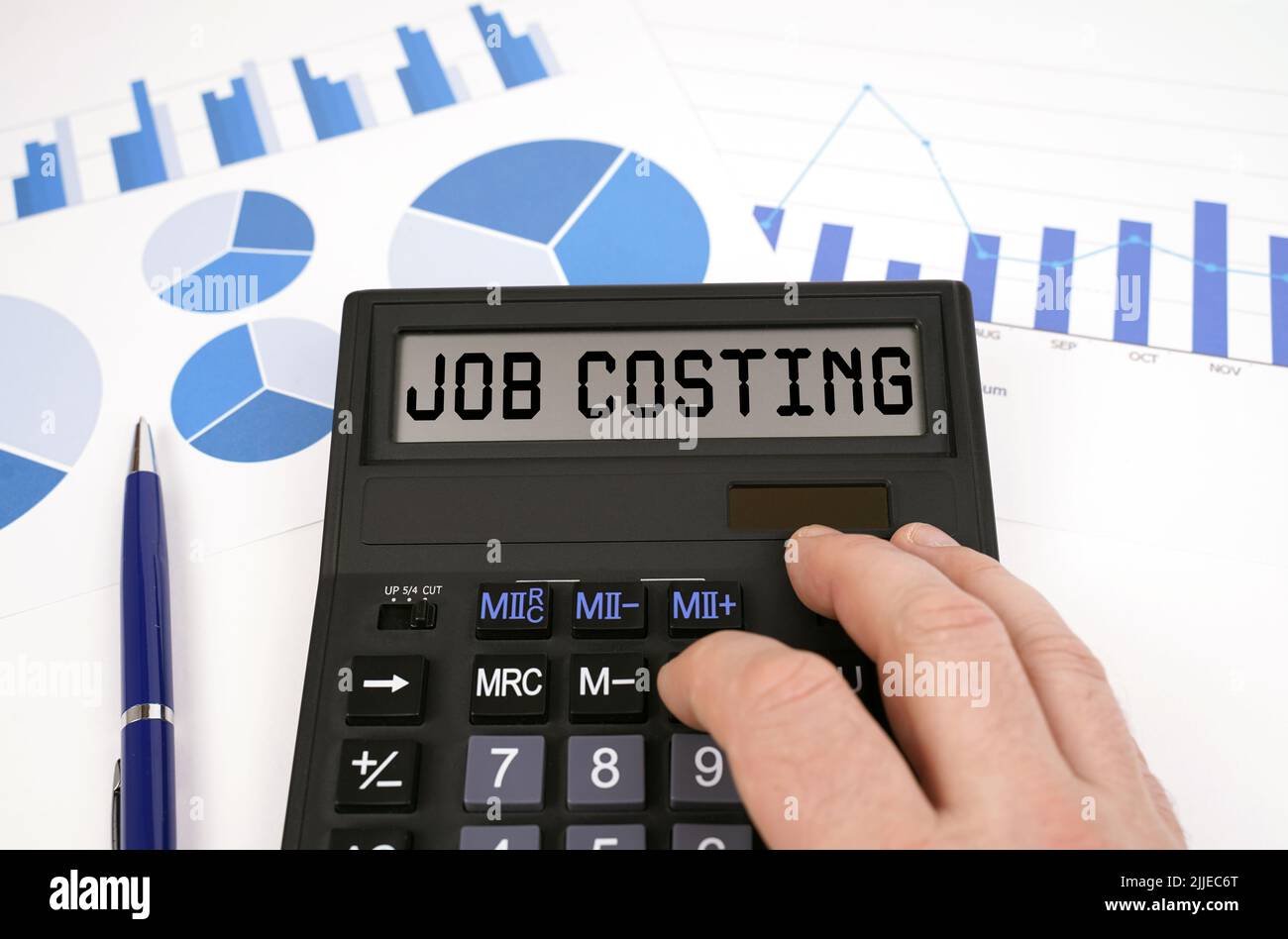 Business concept. There is a calculator on documents with graphs and