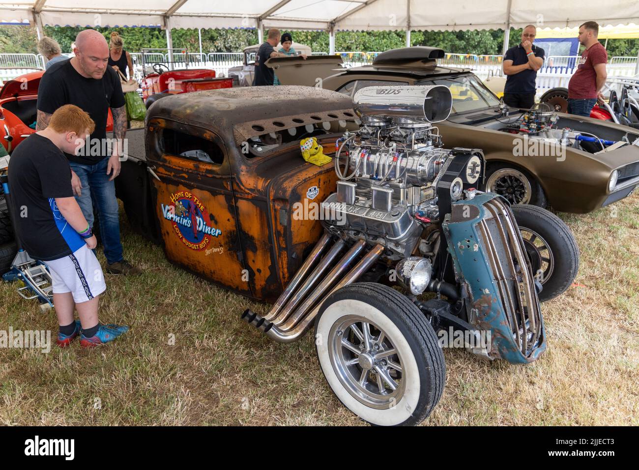 'Vermins Diner, Home of the Low Budget Boys' Rat Rod car at CarFest Stock Photo