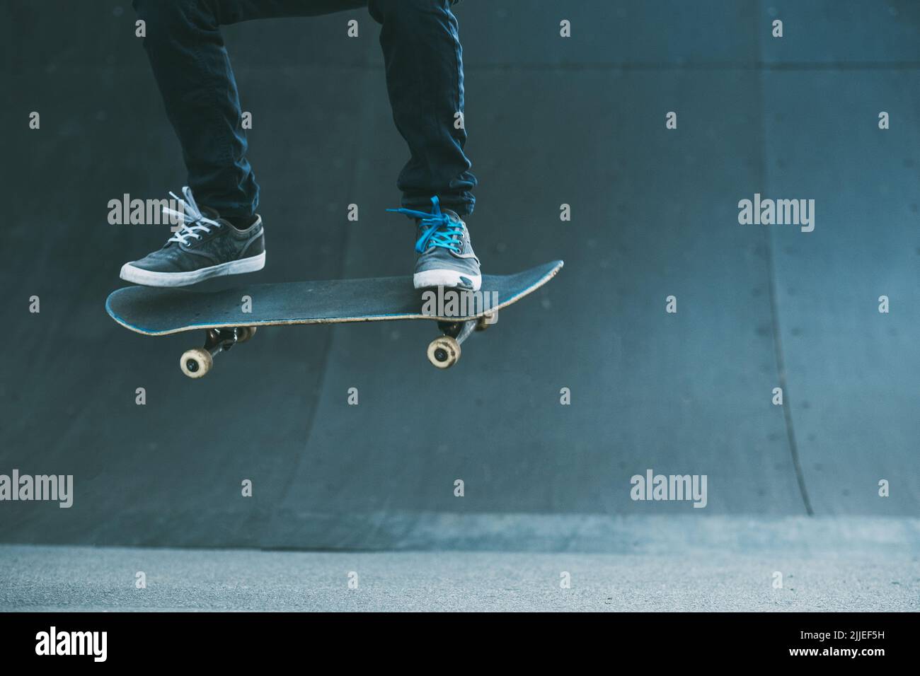 skateboarding hobby man life ollie trick ramp Stock Photo