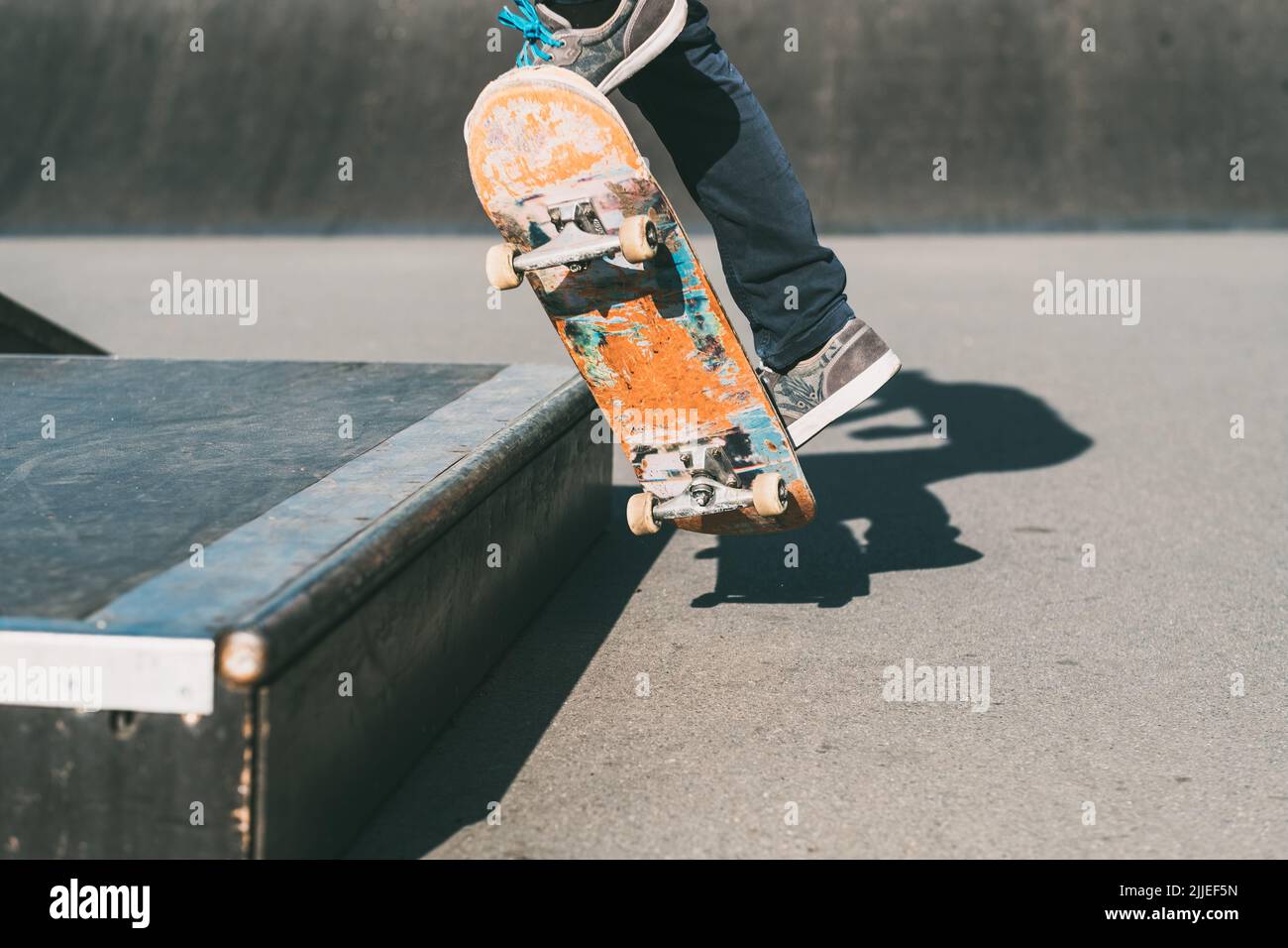 skateboarding man feet sport trick skate park Stock Photo