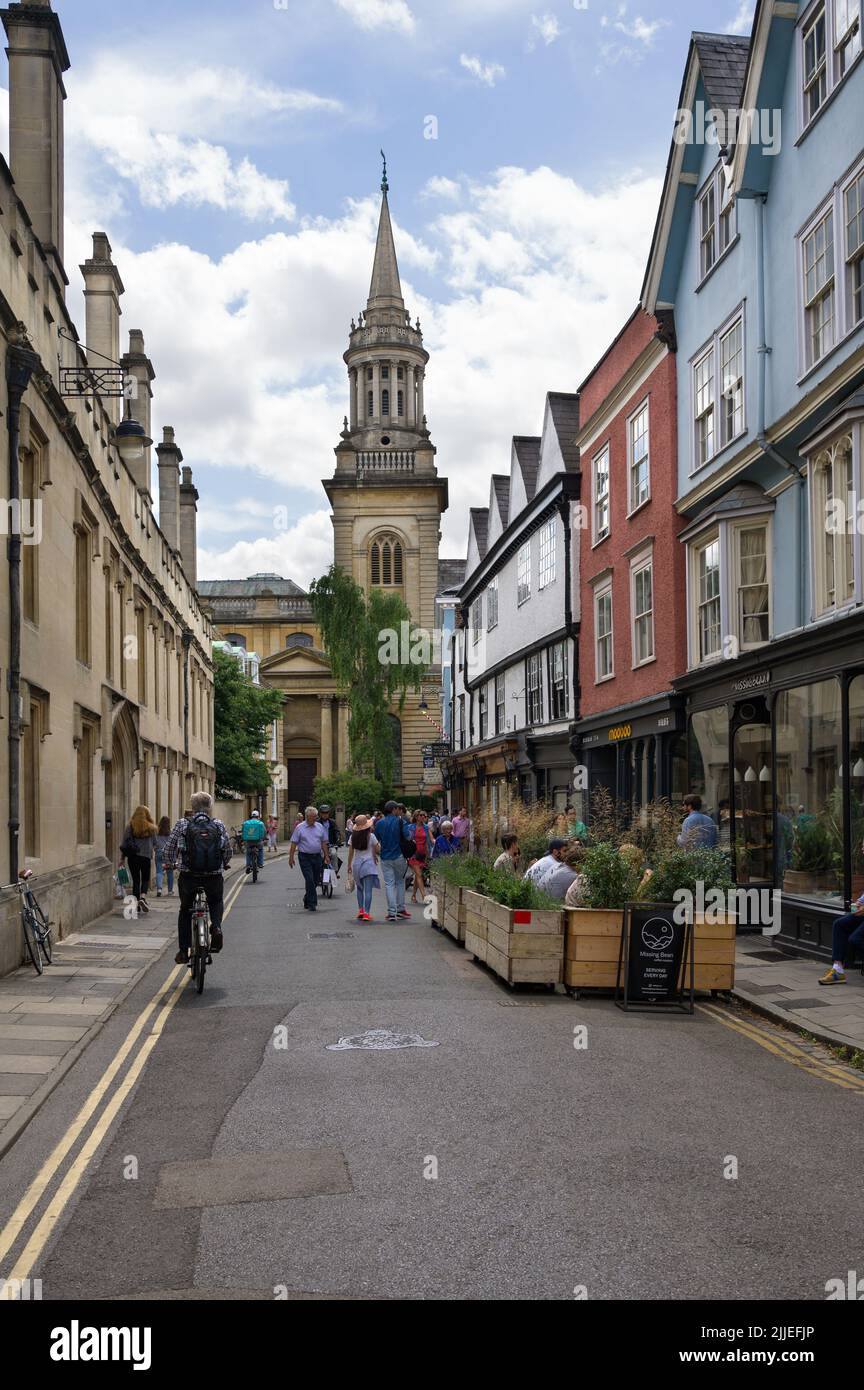 View down Turl Street tourists and buildings, with All Saints Church, Library of Lincoln College in background, Oxford Oxfordshire, UK Stock Photo