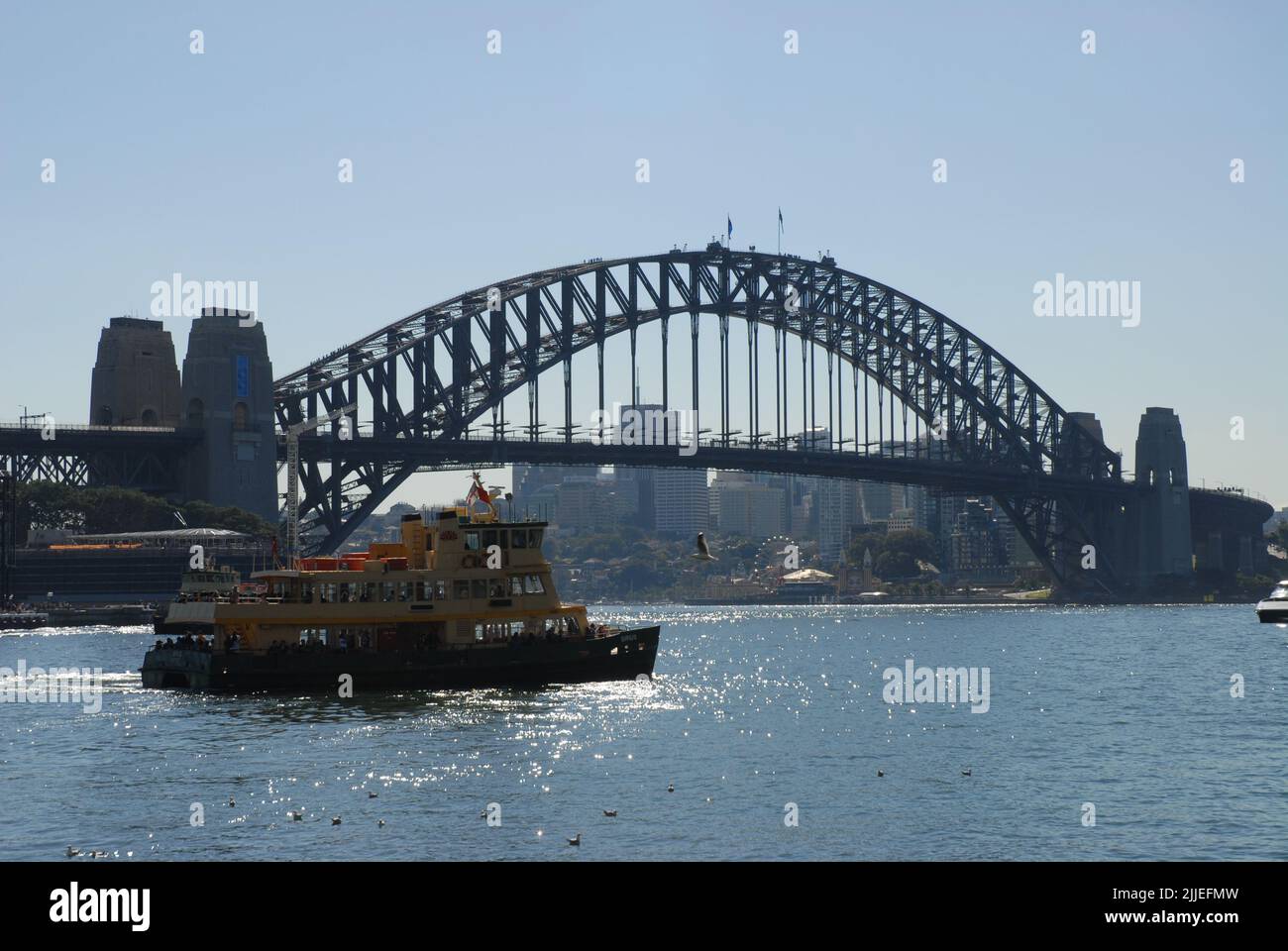 Ferry and Sydney Harbour Bridge, Sydney, NSW, Australia Stock Photo