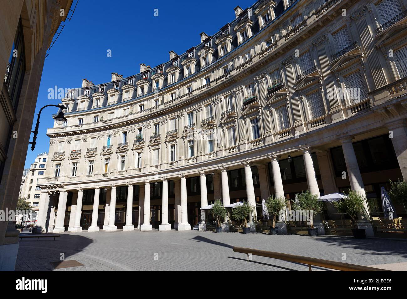 The facades of traditional French houses with typical balconies and