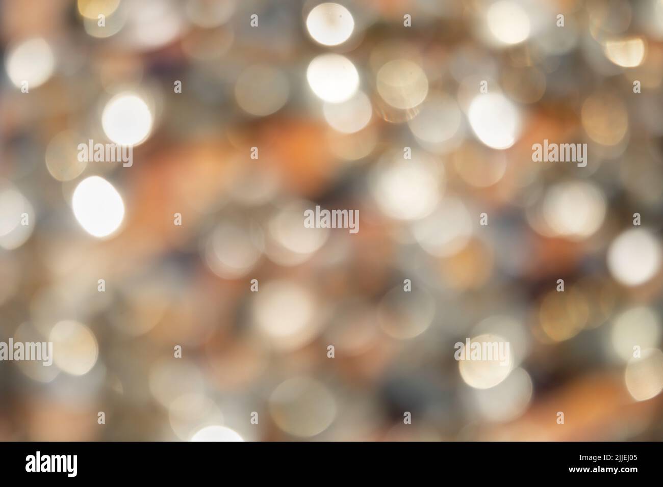Abstract blurred bokeh background with golden circles Stock Photo