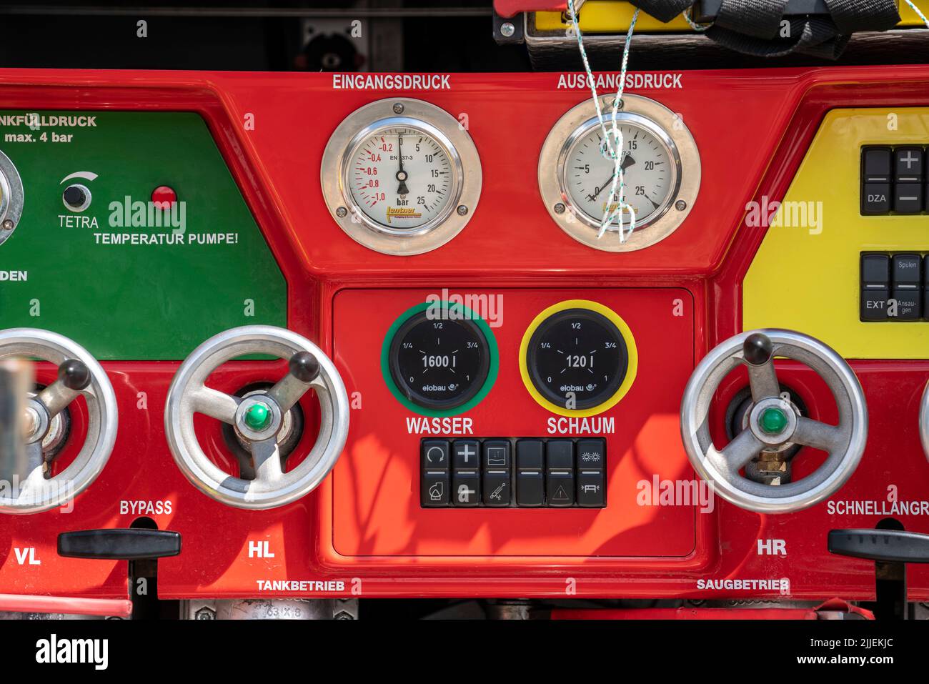 Pump system of a fire engine, water and foam extinguishing agent, handwheels for regulating the water delivery, operation for a rapid fire extinguishi Stock Photo
