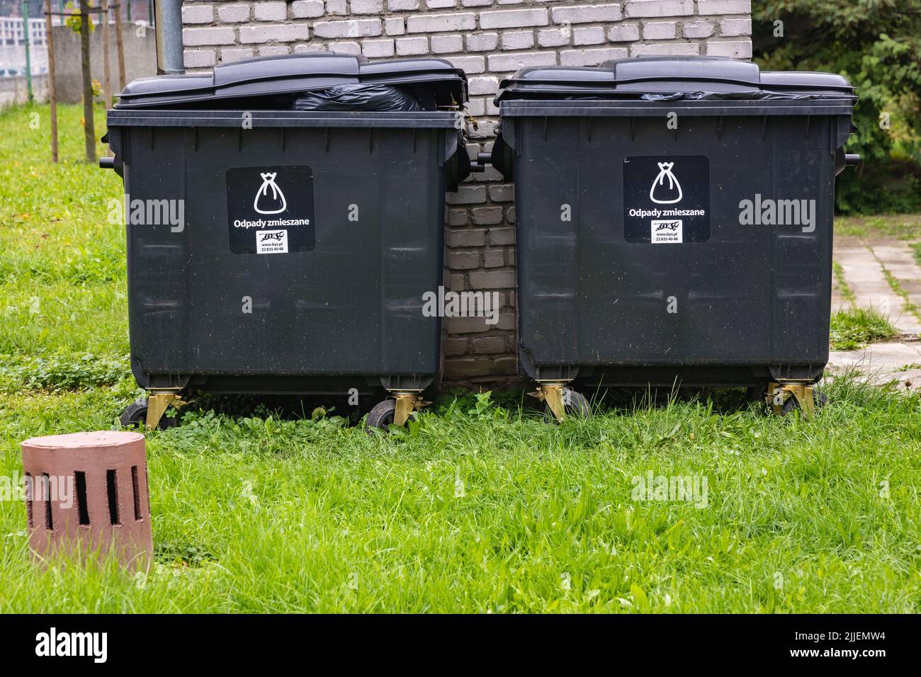 Plastic dumpsters for mixed waste in Warsaw, capital of Poland Stock Photo