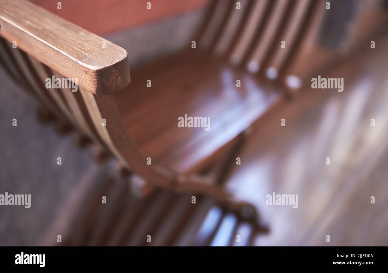 detail of a medieval wooden folding chair with scissor system Stock Photo