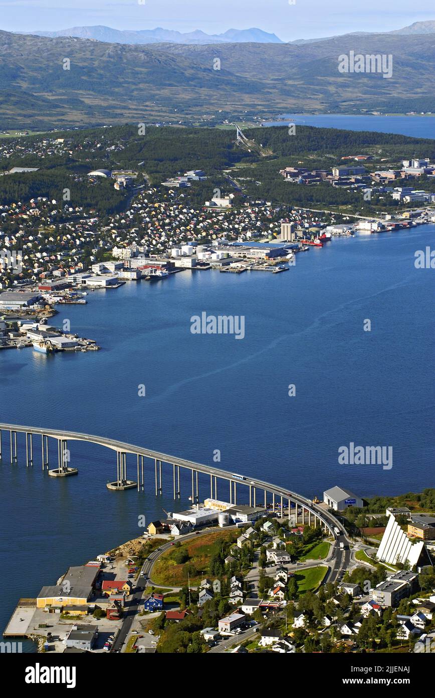 City and surrounding of Tromsoe, view from the Storsteinen Mountain, with Tromsoebrua and the Icesea Cathedral in front, Norway, Tromsoe Stock Photo