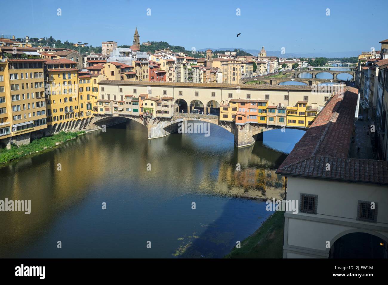 View over River Arno to the Ponte Vecchio from top floor of the Uffizi Gallery in Florence Italy Stock Photo