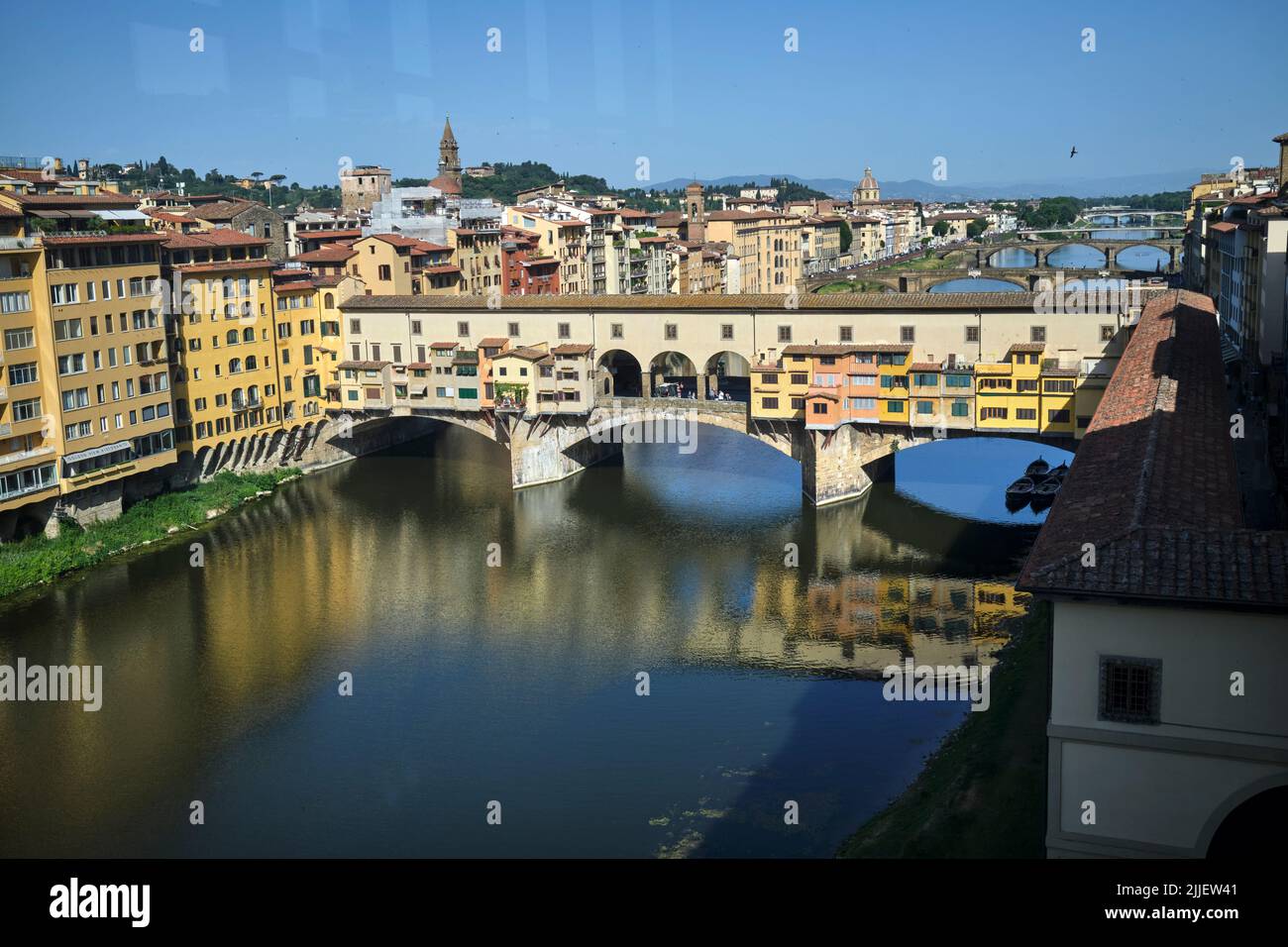 View over River Arno to the Ponte Vecchio from top floor of the Uffizi Gallery in Florence Italy Stock Photo