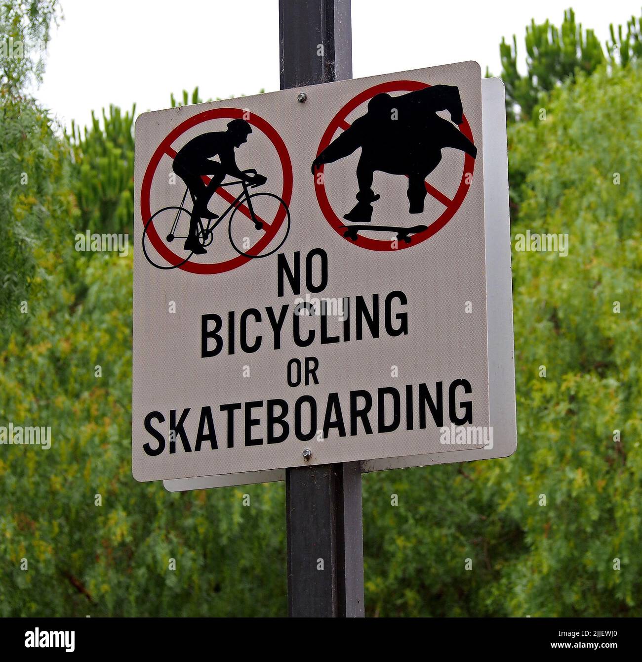 no bicycling or skateboarding sign symbols in William Cann Civic Center in Union City, California Stock Photo