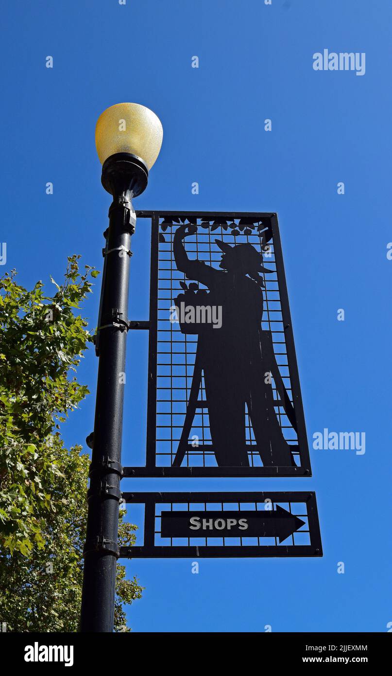shops direction arrow sign on lamp post in the  Niles District, Niles, Fremont, California, American, US, USA, Stock Photo